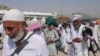 FILE - Muslim pilgrims arrive to cast stones at pillars in the symbolic stoning of the devil, the last rite of the annual hajj, in Mina, near the holy city of Mecca, Saudi Arabia, June 18, 2024. 