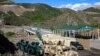 FILE - A view of an Azerbaijani checkpoint at the entry of the Lachin Corridor, the Armenian-populated breakaway Nagorno-Karabakh region's only land link with Armenia, by a bridge across the Hakari River, May 2, 2023.