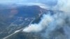 This handout image provided by the BC Wildfire Service on June 5, 2023, shows an aerial view of the Pigeon Creek wildfire near Peachland, British Columbia, Canada. 
