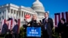 Rep. Marjorie Taylor Greene, joined by Rep. Thomas Massie, says she'll call a vote next week on ousting House Speaker Mike Johnson, during a news conference in Washington, May 1, 2024.