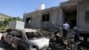 Seorang warga Palestina memeriksa kerusakan pada sebuah rumah di desa Mughayir dekat Ramallah di Tepi Barat, pada 13 April 2024, setelah sebelumnya pemukim Yahudi menyerang desa tersebut. (Foto: AFP/Jaafar Ashtiyeh)