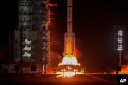 A Long March rocket carrying a crew of Chinese astronauts in a Shenzhou-18 spaceship blast off at the Jiuquan Satellite Launch Center in northwestern China, April 25, 2024.