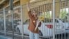 Iran Re-Arrests Reporter Who Interviewed Amini Father, Activists Say