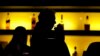 FILE - A patron sips his drink at a bar in New Jersey, Nov. 30, 2017. More than 3 million people die each year from drug- and alcohol-related incidents, the World Health Organization reports. 
