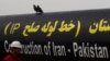 FILE - An Iranian worker walks past the Pakistan-Iran Gas Pipeline Project in Gabd near the Pakistani border in Iran, March 11, 2013.