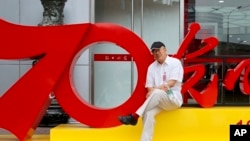 Jurnalis veteran Dong Yuyu berfoto di Beijing, Juni 2019. (Foto: Keluarga Dong via AP)