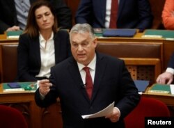 Perdana Menteri Hungaria Viktor Orban berpidato di depan parlemen di Budapest, Hungaria, 13 Desember 2023. (REUTERS/Bernadett Szabo)