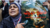 مغربی کنارے کی ایک خاتون بینر کے ذریعے فلسطینیوں کی مصنوعات کے فروغ اور اسرائیلی مصنوعات کے بائیکاٹ کی مہم چلا رہی ہے۔ فوٹو اے ایف پی
