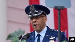 FILE - Air Force General CQ Brown, the U.S. joint chiefs chairman, speaks at Arlington National Cemetery in Arlington, Virginia, May 27, 2024. On July 19, 2024, Brown warned of dire consequences if Western security aid stops flowing to Ukraine.