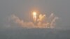 A Long March-5 rocket, carrying the Chang'e-6 mission lunar probe, lifts off as it rains at the Wenchang Space Launch Center in southern China, May 3, 2024. Pakistan's first lunar satellite was aboard the rocket.