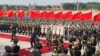 FILE - Chinese President Xi Jinping and Eritrean President Isaias Afwerki attend a welcoming ceremony outside the Great Hall of the People in Beijing, China, May 15, 2023. 
