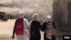 A group of college girls walk in Srinagar, India-administered Kashmir. (Wasim Nabi/VOA)