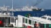 Kapal Garda Pantai China mengerahkan meriam ke arah kapal Unaizah yang disewa oleh militer Filipina untuk membawa pasokan ke beting Second Thomas Shoal di Laut China Selatan, 5 Maret 2024. (Foto: Jam Sta Rosa/AFP)