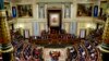 Spain's King Felipe VI, center, gives a speech during the new opening session of the Spanish parliament in Madrid, Nov. 29, 2023. Miguel Angel Oliver Fernández nominated to head the state-run EFE is due to appear before a parliamentary commission on Dec. 21, 2023.