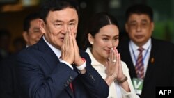 ทักษิณ ชินวัตร อดีตนายกรัฐมนตรีไทย และบุตรสาว แพทองธาร ชินวัตร 