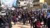 Протести во деловите од Сирија каде што владеат бунтовниците