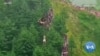 Pakistani Volunteer Saves School Children Stuck in Cable Car