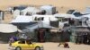 Pengungsi Palestina mengangkut barang-barang mereka di atas mobil saat melarikan diri ke daerah yang lebih aman di Rafah di Jalur Gaza selatan, 9 Mei 2024.