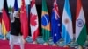 Perdana Menteri India Narendra Modi melambai saat tiba di pusat konvensi Bharat Mandapam untuk KTT G20, di New Delhi, India, Sabtu, 9 September 2023. (Foto: AP/Evan Vucci/Pool)