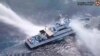 Philippine, Chinese coast guard vessels involved in new confrontation in South China Sea 