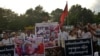 FILE - Myanmar activists protest against Wanbao Mining at China's embassy in Yangon, Nov. 29, 2013. Longtime tensions involving the company were inflamed Aug. 14, 2023, when Burmese troops protecting a Wanbao mine in Sarlingyi Township fired on civilians.