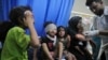 Palestinian children wounded in Israeli strikes are brought to Shifa Hospital in Gaza City on Oct. 11, 2023.