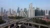 FILE - An aerial view shows highways and buildings in Shanghai, China, March 30, 2022. 