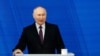 Presiden Rusia Vladimir Putin menyampaikan pidato tahunannya di hadapan Majelis Federal, di Moskow, Rusia, 29 Februari 2024. (Foto: REUTERS/Evgenia Novozhenina)