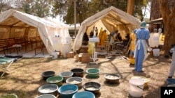 Health workers attend to patients suffering from cholera symptoms at a local hospital in Harare, Tuesday, Sept, 11, 2018. Zimbabwe has recorded 100 suspected deaths from cholera and more than 5,000 possible cases since late Sept. 2023. (AP)