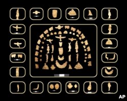 These artifacts were discovered inside tombs at the Tell al-Deir necropolis, in the Nile Delta town of Damietta, about 125 miles (200 km) north of Cairo, Egypt. (Egypt's Supreme Council of Antiquities via AP)