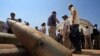 FILE - Cluster bomb units are displayed at a Lebanese military base in Nabatiyeh, Sept. 12, 2011. The Biden administration said July 7, 2023, that it would provide cluster munitions to Ukraine in the latest military aid package for the war against Russia.