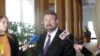 Australian independent Sen. Derryn Hinch holds a press conference in Parliament House in Canberra, Australia Tuesday, May 30, 2017. Hinch welcomes government support for legislation that he helped draft which would ban convicted pedophiles from traveling overseas in what the government says is a world-first move to protect vulnerable children in Southeast Asia from exploitation.