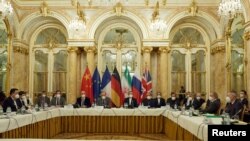 FILE - Officials wait for the start of a meeting of the JCPOA Joint Commission in Vienna, Austria, Nov. 29, 2021. (EU Delegation in Vienna/handout via Reuters)
