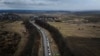 Stuck for Days in Their Cars, Ukrainians Wait to Flee
