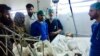 A wounded man receives treatment in a hospital, after a bombing in Mazar-e-Sharif, northern Afghanistan, April 28, 2022. Two explosions came within minutes of each other.