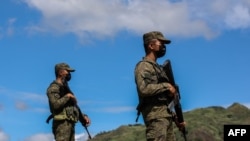 Anggota pasukan militer Filipina tampak berjaga dalam latihan gabungan militer antara AS dan Filipina di Capas, Provinsi Tarlac, pada 31 Maret 2022. (Foto: AFP/Jam Sta Rosa)