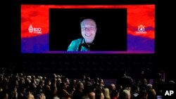 CEO Tesla Elon Musk berbicara selama pertemuan virtual di KTT B20 menjelang KTT para pemimpin G20 di Nusa Dua, Bali, Senin, 14 November 2022. (AP/Aaron Favila)
