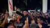 Perdana Menteri Malaysia yang baru dilantik Anwar Ibrahim melambai kepada para pendukungnya setelah konferensi persnya di Sungai Long, Selangor, Malaysia 24 November 2022. (Foto: Kantor Anwar Ibrahim/Sadiq Asyraf via REUTERS)