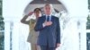 FILE - Pakistan's Prime Minister Shehbaz Sharif gestures during the guard of honour ceremony in Islamabad, April 12, 2022. (Press Information Department handout via Reuters). Journalist Ayaz Amir was assaulted after he gave a speech critical of Sharif, who condemned the assault.
