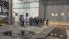 라파엘 그로시 국제원자력기구(IAEA) 사무총장이 이끄는 조사단원들이 1일 우크라이나 남부 자포리자 원자력 발전소를 둘러보고 있다. 러시아 국방부가 2일 공개한 영상에서 캡쳐한 장면. 