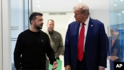 FILE - U.S. President Donald Trump meets with Ukrainian President Volodymyr Zelenskyy at Trump Tower, Sept. 27, 2024, in New York before his return to the White House.