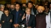 Pakistan opposition leader Shahbaz Sharif, center, speaks at a press conference in Islamabad, Pakistan, April 7, 2022.