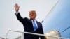 President Donald Trump waves before boarding Air Force One for a trip to Charlotte to deliver remarks on health care, Thursday, Sept. 24, 2020, in Andrews Air Force Base, Md. (AP Photo/Evan Vucci)