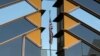 FILE - The U.S. flag is reflected on the windows of the U.S. Embassy in Kabul, Afghanistan, July 30, 2021. 