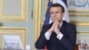 file photo taken on March 19, 2020 French president Emmanuel Macron, takes part on a videoconference of the "economic task force",