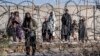 Tentara Taliban memeriksa lokasi ledakan, dekat Kementerian Dalam Negeri, di Kabul, Afghanistan, 1 Januari 2023. (Foto: AP)