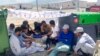 Security Concerns Leave Afghan Evacuees Stuck in Balkan Camp 