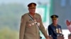Pakistan's Army Chief General Qamar Javed Bajwa arrives to attend a military parade to mark Pakistan National Day in Islamabad, Pakistan, March 23, 2022. 