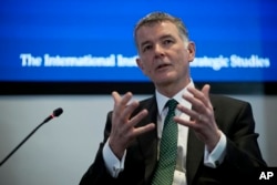 Richard Moore, the Chief of Britain's Secret Intelligence Service, also known as MI6. (AP Photo/Matt Dunham)