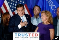 Republican presidential candidate Sen. Ted Cruz, R-Texas, speaks as his wife Heidi listens during a primary night campaign event, April 5, 2016, in Milwaukee.